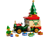 Colorful toy delivery truck with Christmas tree on top, mini elf figure, presents, and festive decorations for holiday play.