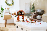 Seasons and Occassions Gingerbread AT-AT Walker displayed with festive holiday decorations