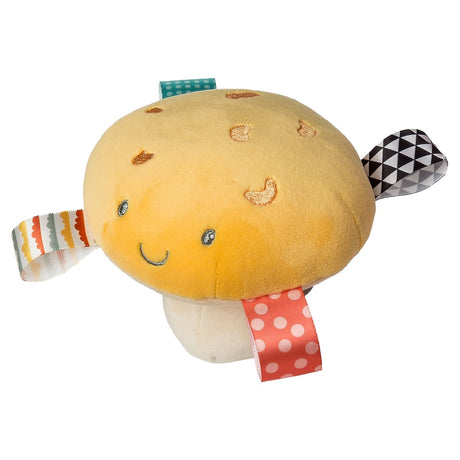 Taggies Fun Guys Mushroom Rattle in yellow with embroidered face and colorful sensory ribbon tags for baby playtime.