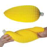 Easy Sqweezy Corn yellow corn shaped squishy toy shown whole and stretched by hand