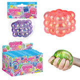 Sugar Swaps Bubble Cube colorful bubble-shaped squishy toys shown in packaging and held in a hand