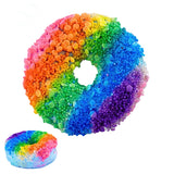 Donut Rainbow Bath Bomb with vibrant colors and textured surface, perfect for softening skin and sweet fruity fragrance.