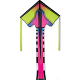 Brightly colored diamond-shaped kite with neon green, pink, and black geometric patterns and long tail ribbons