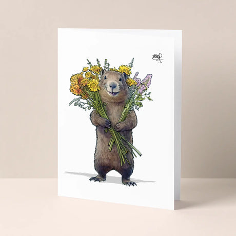 Wild Smile Groundhog Card showing a smiling groundhog holding colorful flowers on FSC certified paper.