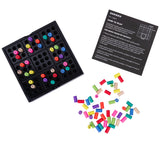 Sudoku game board with colorful numbered pegs and instruction card beside loose playing pieces