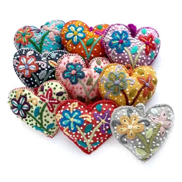 Colorful handmade Embroidered Heart Ornament with floral designs, vibrant patterns, and textured French dots from Peru artisans.