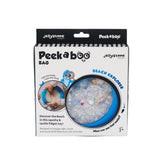 Packaging of a tactile Beach Explorer fidget toy filled with small beads and colorful hidden objects inside a round blue case