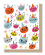 Colorful whimsical cat faces wearing birthday hats with starburst patterns on a festive tri-fold greeting card design
