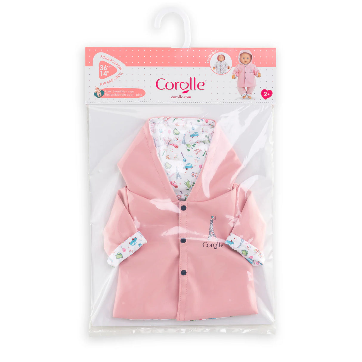 Pink doll raincoat with hood and colorful animal-themed lining in clear plastic packaging