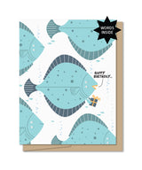 Illustration of a blue halibut fish holding a gift with text Happy Birthday on a greeting card