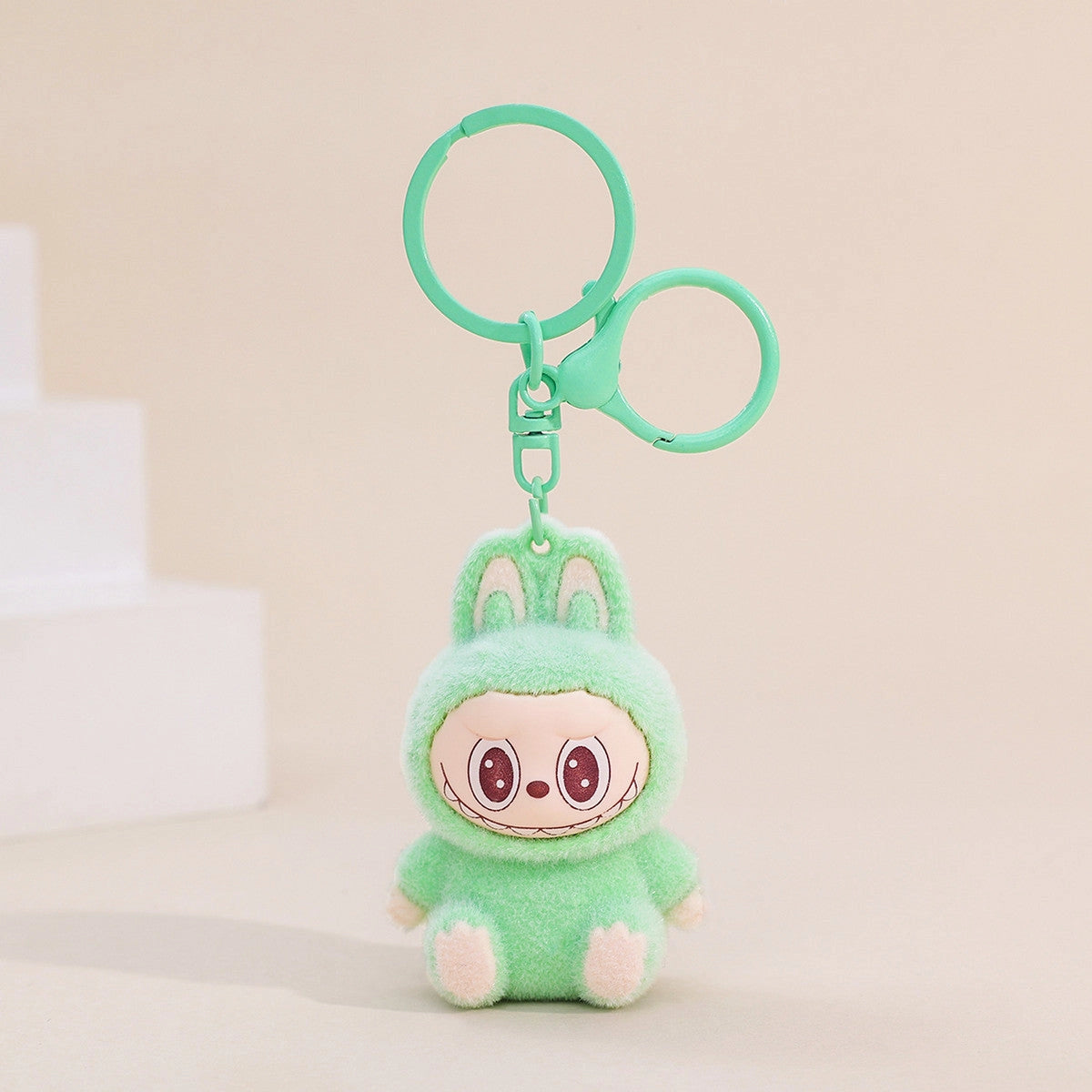 Labubu Flocking Keychain in green with fuzzy texture and cute bunny design, perfect for adding playful charm to your keys.