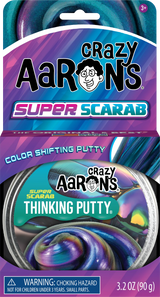 Color shifting putty with swirling metallic hues of purple, blue, green, and gold in round packaging and colorful branded box design