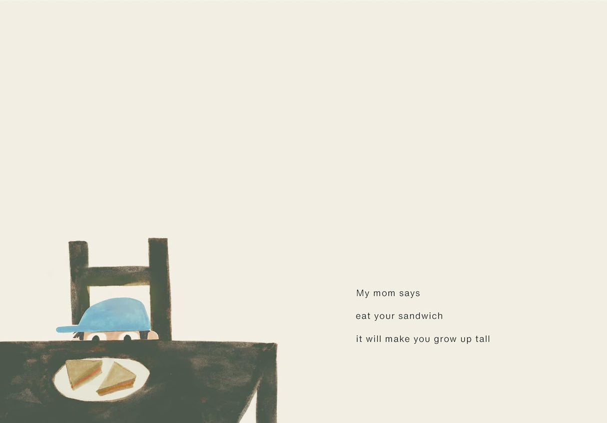 I Wonder if I'm Growing children's book illustration of a child at a table with a sandwich
