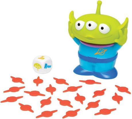 Toy Story Alien Game with green three eyed alien toy red candy pieces and game die