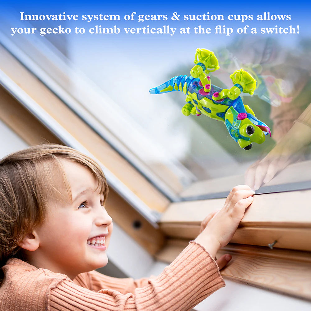 Child watching excitedly as colorful robotic gecko climbs smoothly up a window using suction cup feet and gears