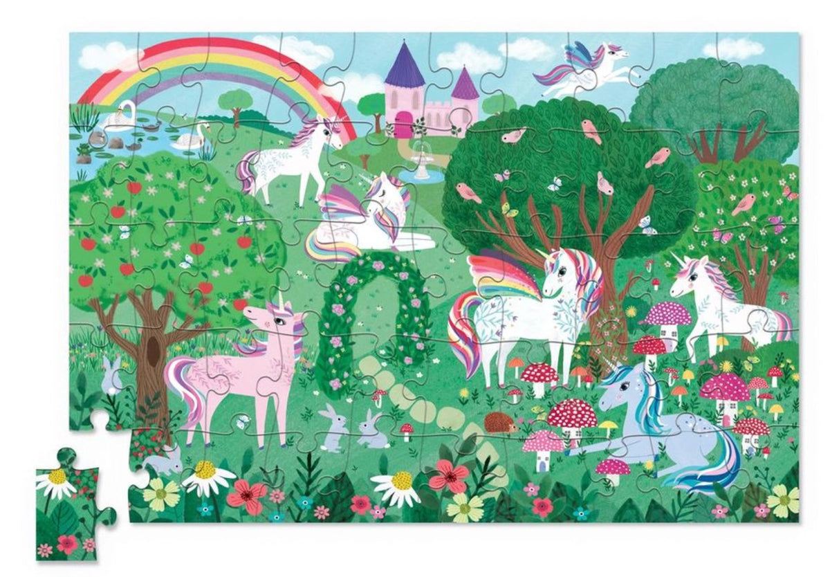 50pc Unicorn Holographic Puzzle featuring colorful unicorns, a rainbow, flowers, trees, and a magical castle landscape