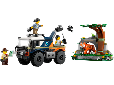 Toy off-road truck with rugged tires and movable camera alongside jungle scene with tiger and tree figures