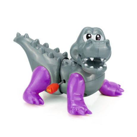 Gray and purple wind-up alligator toy with moving head and walking action on a white background
