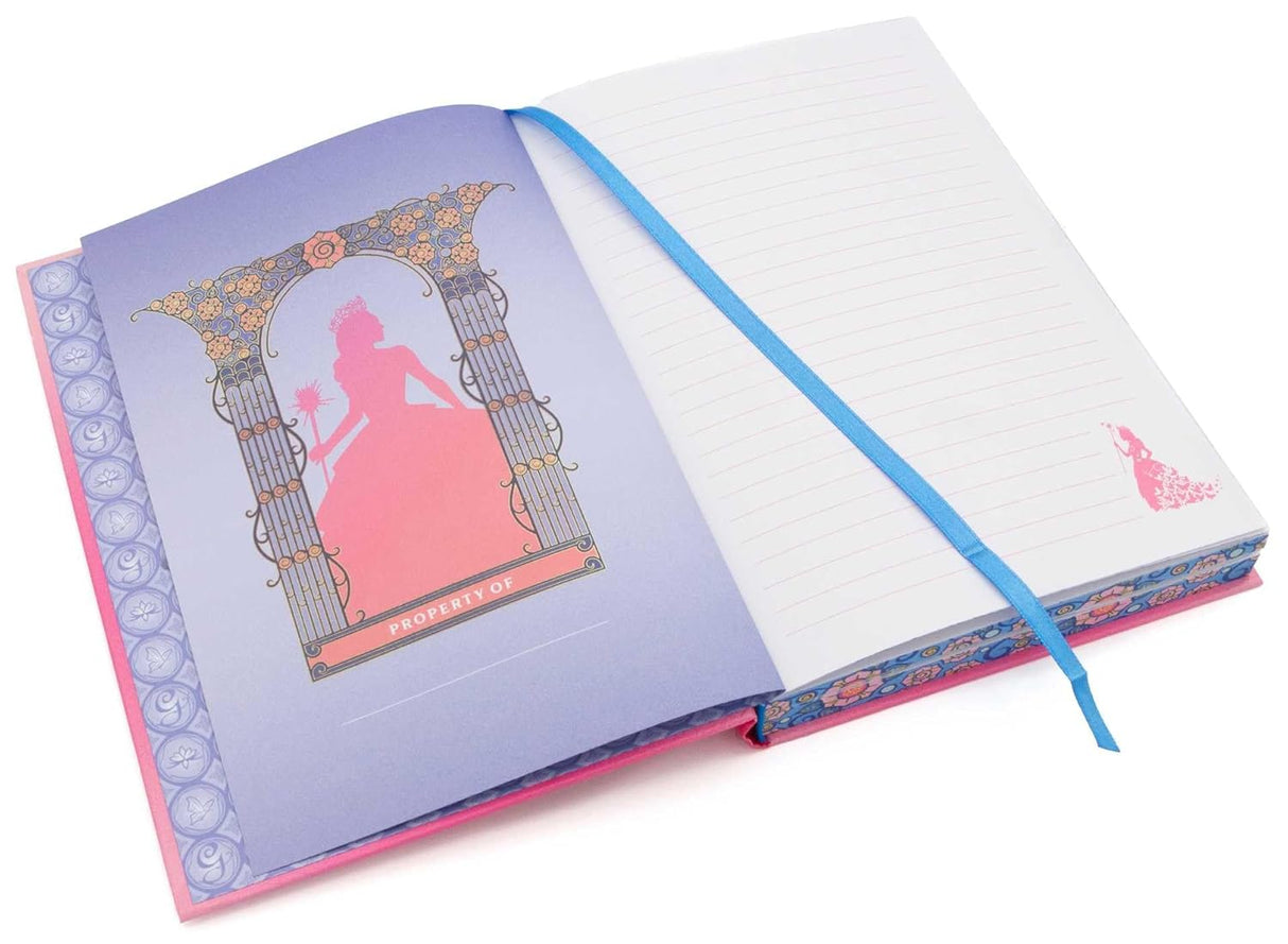 Open Wicked Glinda Journal showing lined pages with decorative Glinda Upland silhouette and blue ribbon bookmark.