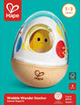 Colorful egg-shaped stacker toy with a hidden chick inside and wooden base designed for toddlers aged 1 to 3 years