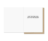 Open birthday card with the message I got you this card just for the halibut in simple black text on a white background