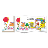 Tri-fold birthday card with cheerful animal characters and colorful balloons celebrating around cake slices.