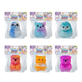 Six colorful Taba-licious Pets squishy toys including dog, cat, seal, hedgehog, and vibrant critters in clear packaging