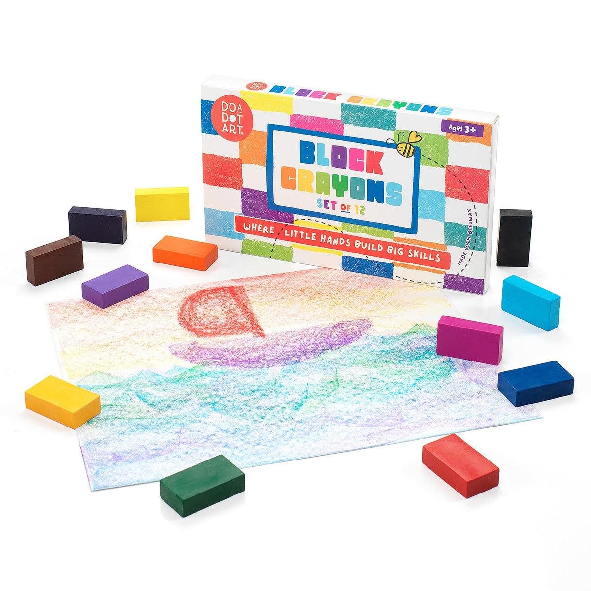 Colorful rectangular blocks surrounding a bright crayon drawing on paper