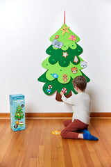 Decorate Your Own Christmas Tree felt wall decoration with child adding colorful ornaments at home