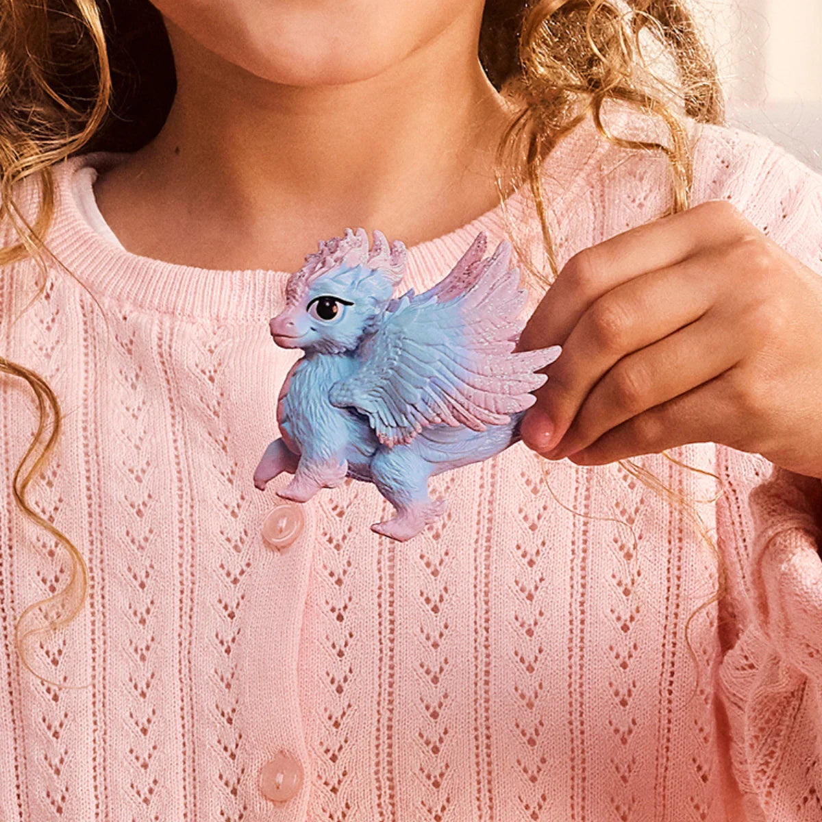 Bayala | Baby Crystal Dragon blue winged toy held by a child