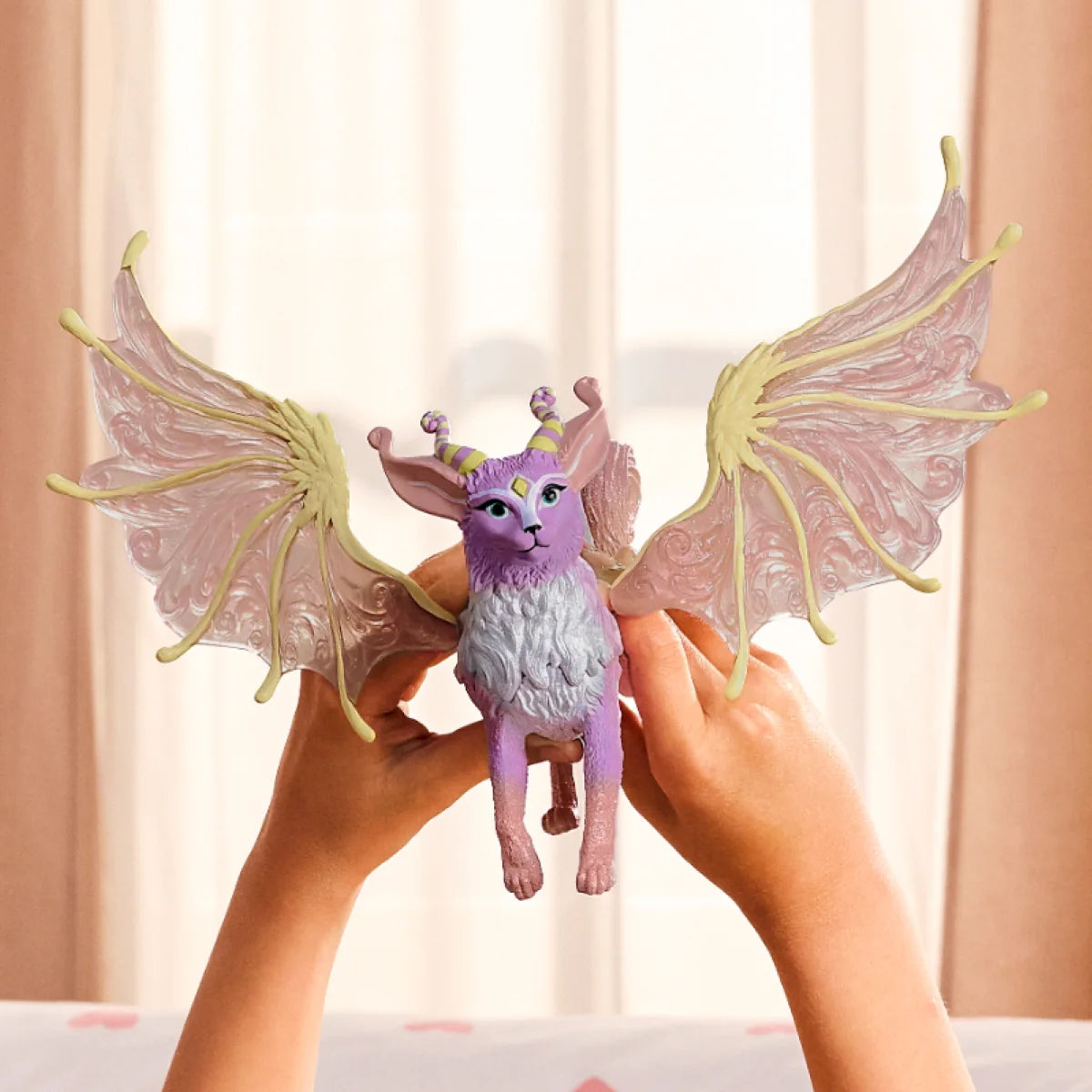 Bayala | Winged Cat Dragon purple winged toy held in hands