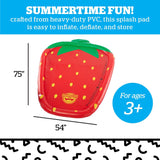Inflatable splash pad shaped like a red strawberry with green leaves and yellow seed details for children three and older