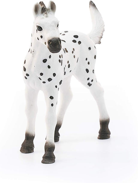 Knapstrupper Foal Horse toy with realistic white and black spotted design, perfect for inspiring children about animals.