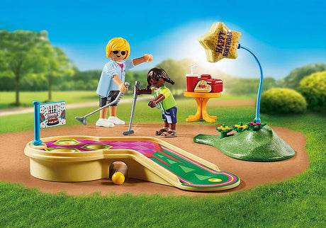 My Life | Mini Golf set with two figures playing on a colorful miniature golf course and birthday decorations outdoors.