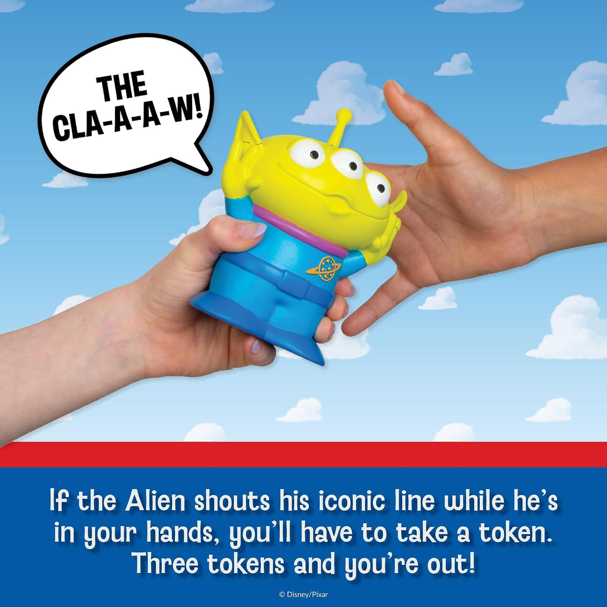 Toy Story Alien Game featuring a colorful three eyed alien toy held in two hands