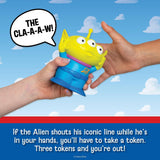 Toy Story Alien Game featuring a colorful three eyed alien toy held in two hands