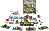 Minecraft: Heroes of the Village board game with cards tiles dice and colorful game pieces