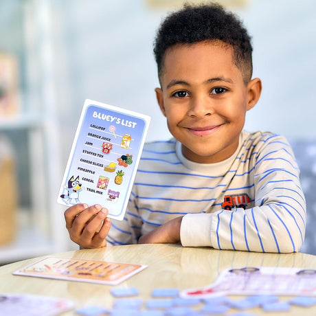Bluey Shopping List Game with a child holding a shopping list card during play