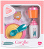Small baby doll mealtime set with pink plate, yellow bowl, teal spoon, pink sippy cup, and white bottle with bear illustration