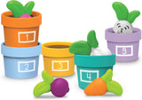 Colorful numbered stacking pots with hidden vegetables and a bunny for a preschool counting and color learning game