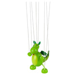 Green wooden dragon marionette puppet with wings and flexible limbs hanging by white strings