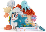Sensorial Reef baby toy with squeezable coral, octopus rattle, starfish, and colorful seabed elements for sensory play.