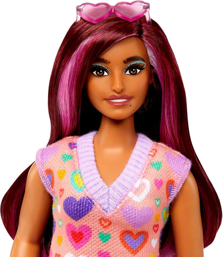 Barbie Fashionista #04 doll with curvy body, long pink-streaked hair, heart sunglasses, and colorful heart print sweater dress.