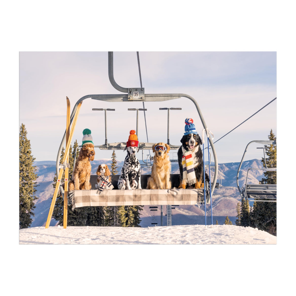 1000pc Chairlift Pups Aspen Puzzle featuring dogs on a snowy mountain chairlift