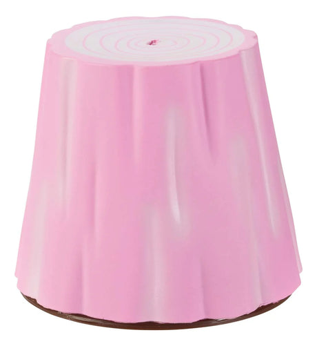 Pink tree stump toy container for the Grow Unicorn water-grow toy with a gold horned unicorn inside.