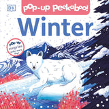 Cover of a children’s pop-up board book showing a white arctic fox in a snowy winter landscape with mountains.