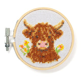 Mini CrossStitch Embroidery Kit | Highland Cow featuring a stitched cow in a wooden hoop