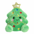 Plush Christmas tree with smiling face, colorful decorations, and gold star on top sitting on white background