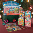 100pc Christmas Market Puzzle featuring festive village storefront boxes and a colorful holiday market scene