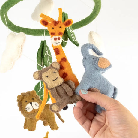 Felt Mobile | Baby Jungle Animal featuring handmade wool lion, monkey, giraffe, and elephant hanging from a felt hoop.